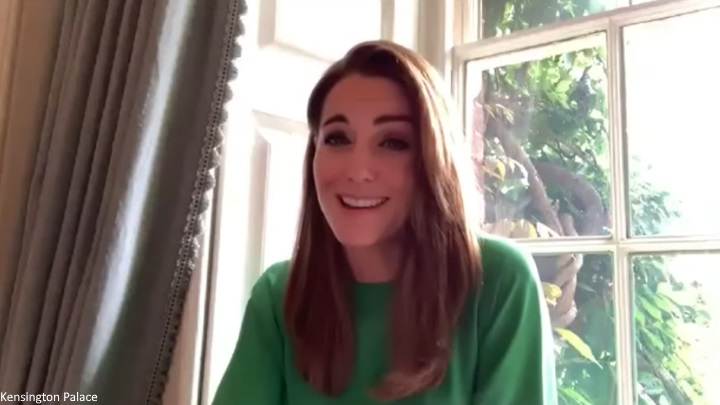 Kate on a video call in green dress